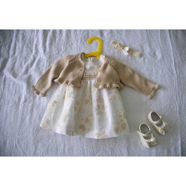 Christening background with baptism baby dress and shoes