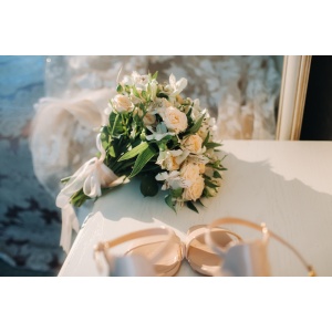 wedding bouquet with roses on the table.The decor at the wedding